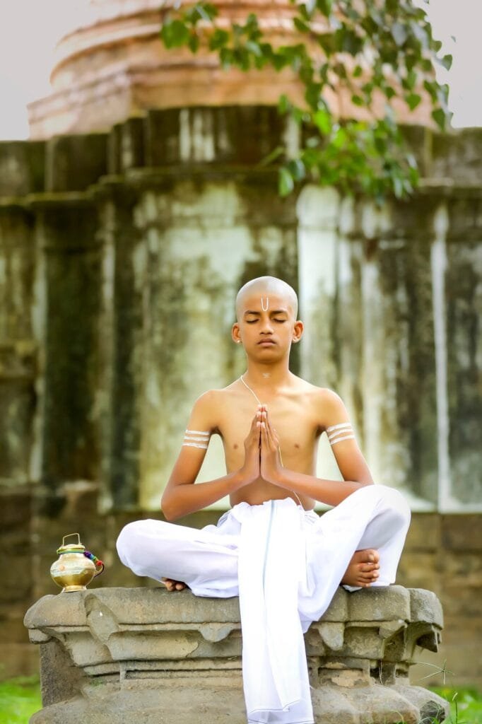 boy doing yoga in Gurukul